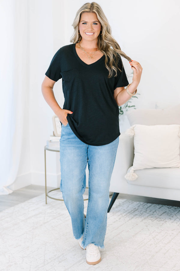 Plus Size black v-neck top with a relaxed fit, short sleeves, and a functional front chest pocket.