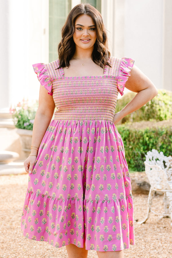 Plus Size pink floral dress with a smocked bodice, ruffle straps, and a tiered midi skirt.