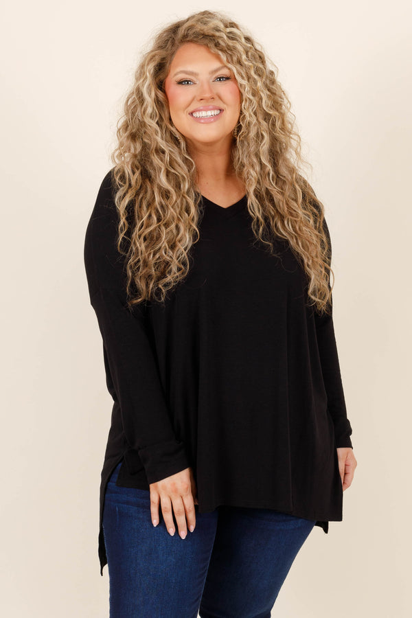 Chic Soul plus size clothing, soft black long sleeve top with slight v neckline and slits on the bottom sides