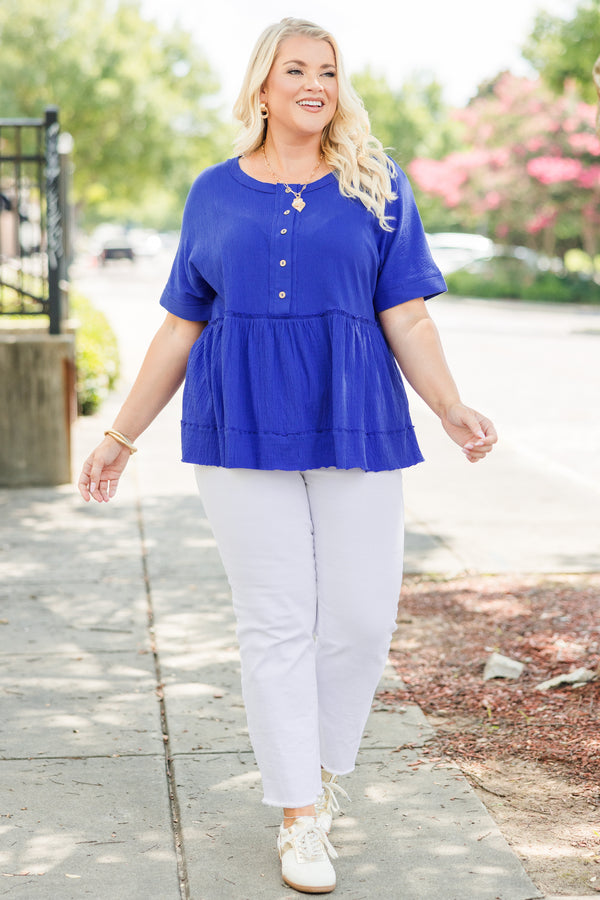 Chic Soul Plus size clothing, bright blue short sleeve casual top with distressed stichting details and buttons going down the chest 
