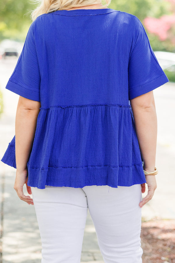 Chic Soul Plus size clothing, bright blue short sleeve casual top with distressed stichting details and buttons going down the chest 
