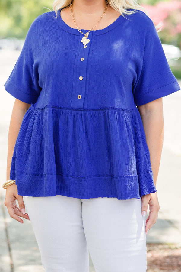 Chic Soul Plus size clothing, bright blue short sleeve casual top with distressed stichting details and buttons going down the chest 
