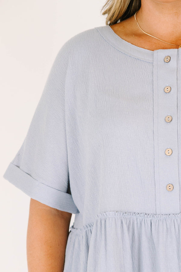 Chic Soul plus size clothing, dusty blue, short-sleeve, babydoll top with buttons going half way down the front.