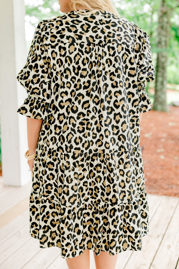 Chic Soul plus size clothing, Short sleeve  leopard print baby doll dress with a ruffle detail at the end of the sleeve and a slight v-neckline 