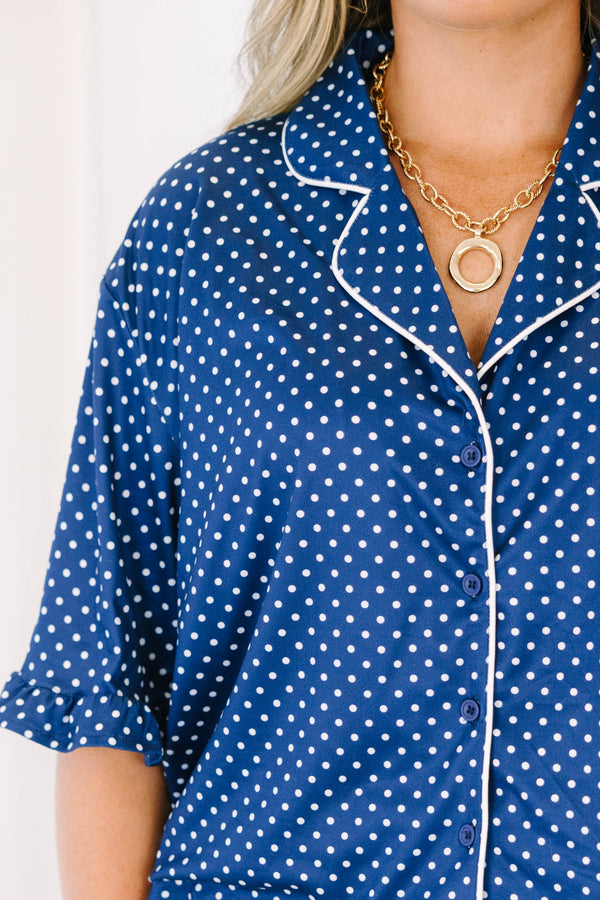 Plus Size light leopard print pajama set with a button-down short sleeve top and matching shorts.