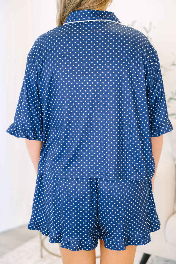 Plus Size light leopard print pajama set with a button-down short sleeve top and matching shorts.