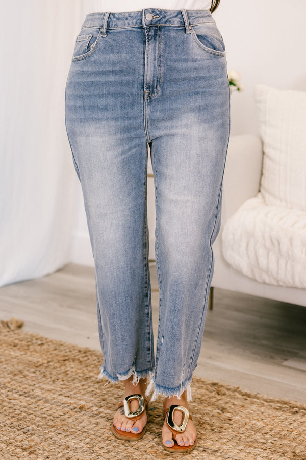 Chic Soul plus size clothing, high-waisted light wash straight leg cropped denim jeans with a distressed frayed hem and a silver button detailing 