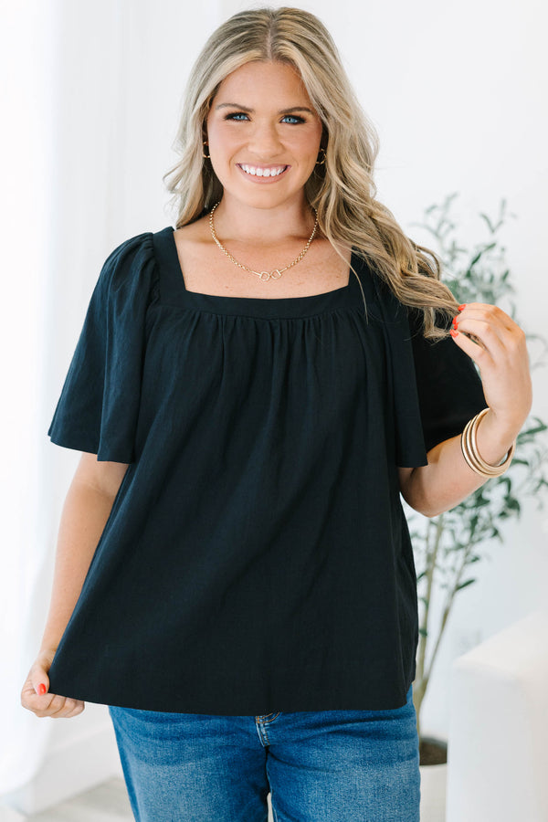 Plus size black cotton top with breezy bell sleeves and a modern square neckline.