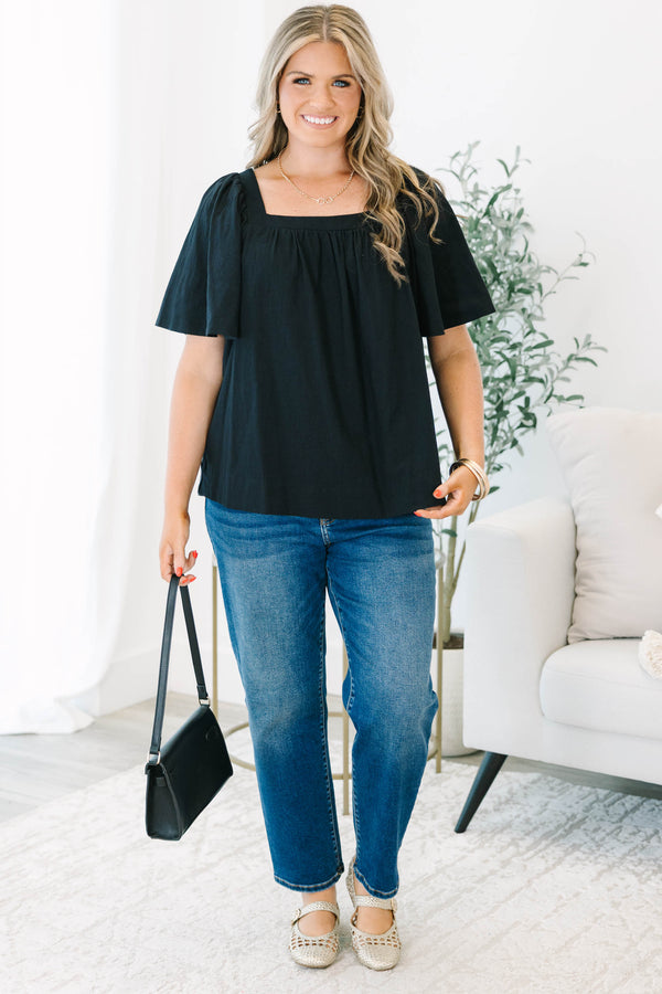 Plus size black cotton top with breezy bell sleeves and a modern square neckline.