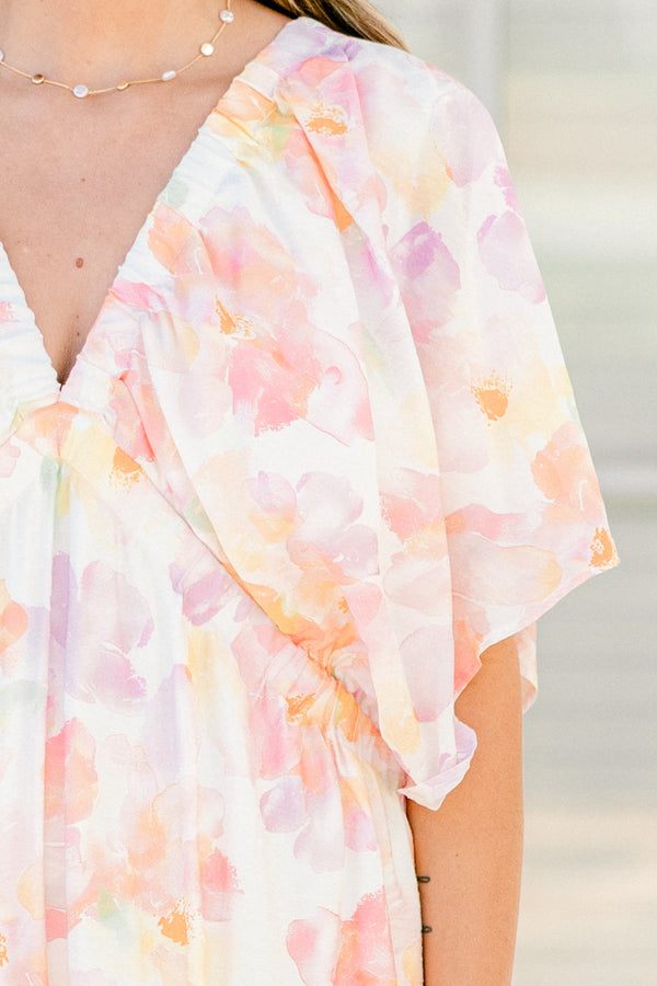 Chic Soul Plus size clothing, white midi dress with a multi color floral pattern a deep v-neckline and flowy short sleeves
