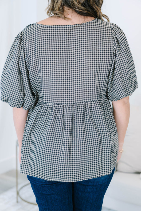 Plus Size black and white gingham top with floral embroidery, puff sleeves, and black ribbon ties.