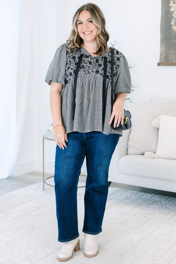 Plus Size black and white gingham top with floral embroidery, puff sleeves, and black ribbon ties.