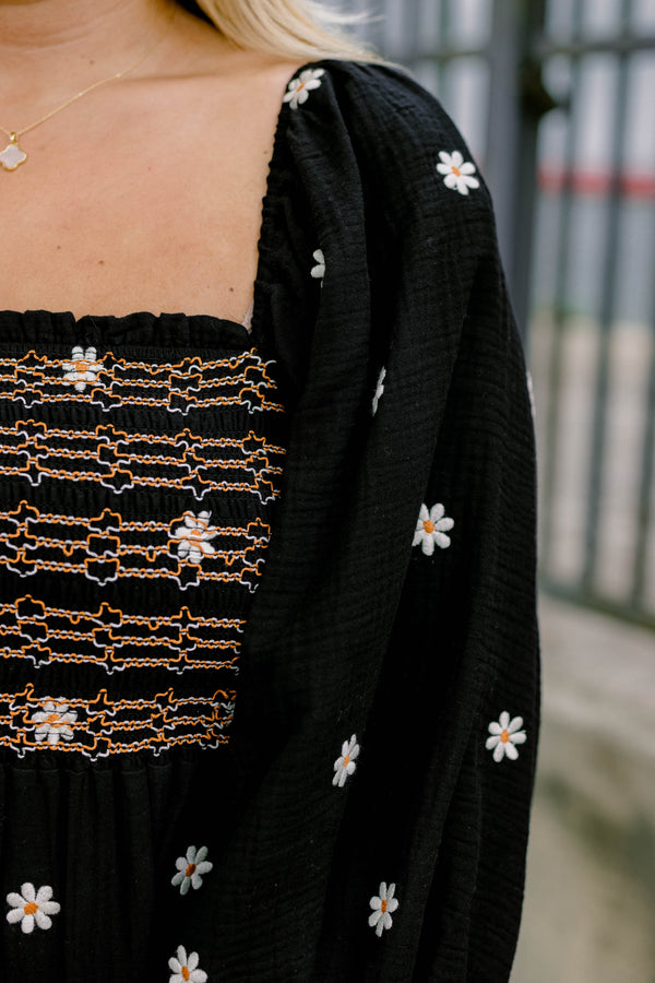 Chic Soul plus size clothing, black long sleeve flowy tiered maxi dress with square neckline and ruched texture top and small white flowers on it