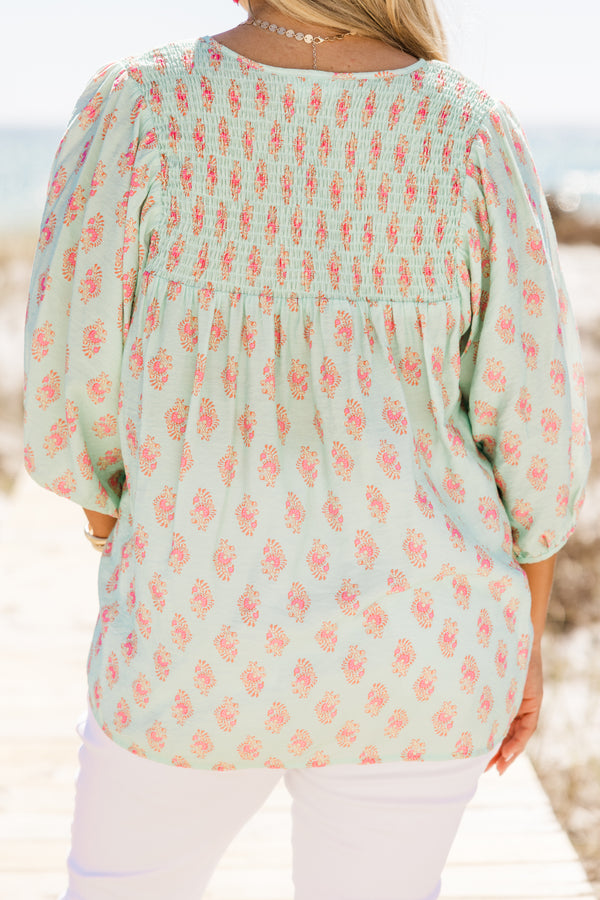 Chic Soul plus size clothing, turquoise three quarter length sleeve flowy top with v neckline with tie detail with pink floral print 