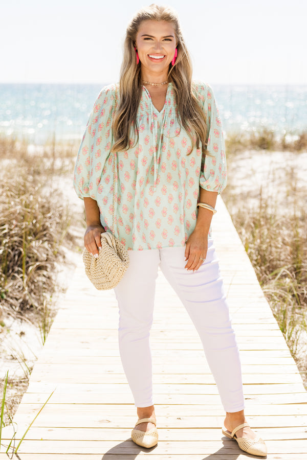 Chic Soul plus size clothing, turquoise three quarter length sleeve flowy top with v neckline with tie detail with pink floral print 