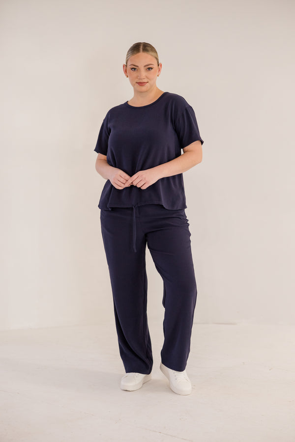 Chic Soul plus size clothing, ink navy straight leg pant with elastic back waistband with button closure in front with pockets