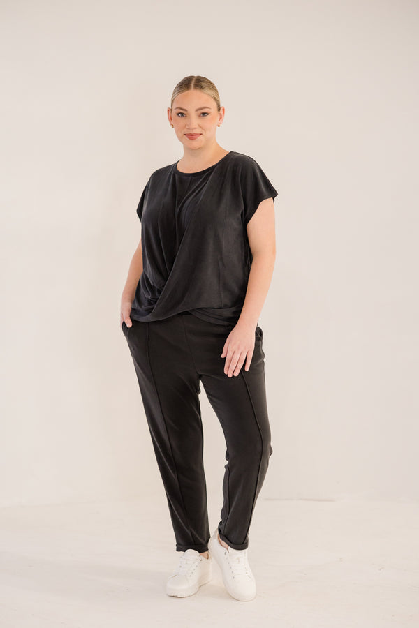 Chic Soul plus size clothing, black short sleeve flowy top with cross front detail with round neckline