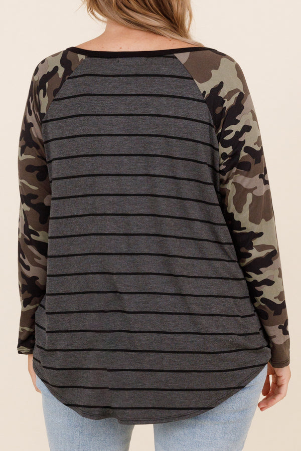 Chic Soul plus size clothing, olive colored top with grey and black stripes and faux camo sleeves and small pocket on left side of the chest and micro v neck detailing