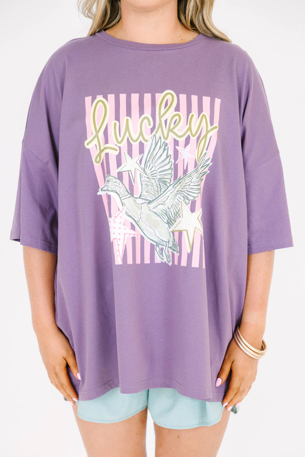 Plus Size lilac grey boyfriend tee with a lucky duck graphic paired with light blue shorts.
