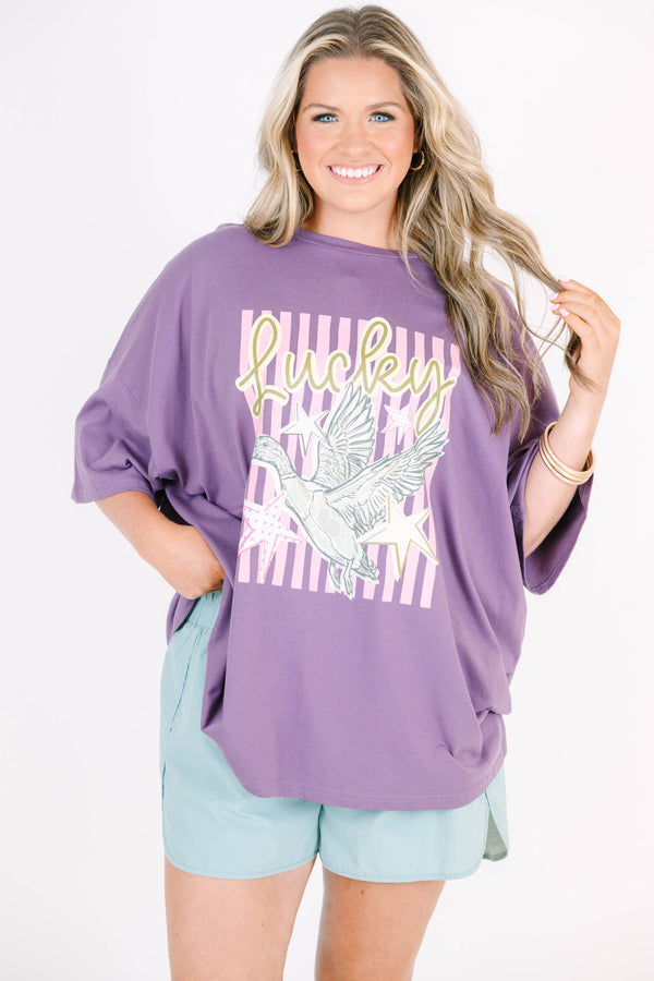 Plus Size lilac grey boyfriend tee with a lucky duck graphic paired with light blue shorts.