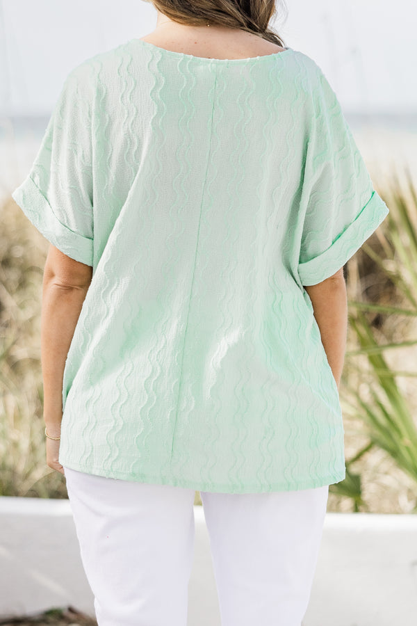 Chic Soul plus size clothing, mint green top with subtle vertical wavy line texture and rolled hem short sleeves