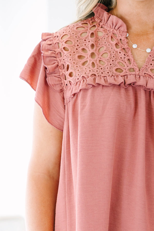 Plus Size pink top with eyelet lace yoke, ruffled neckline, and short flutter sleeves.