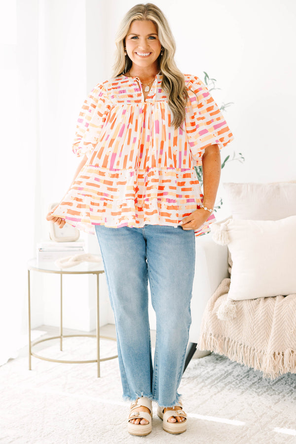 Chic Soul plus size clothing, orange abstract flowy short sleeve top with v neckline and smocked chest detail with large puff sleeves
