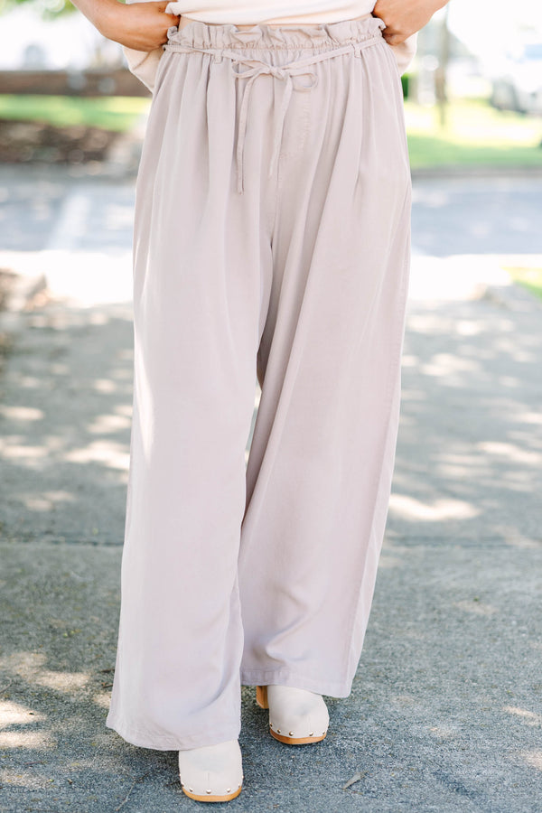 Mocha high-waisted wide-leg palazzo pants with an elastic paper bag waist and self-tie drawstring.