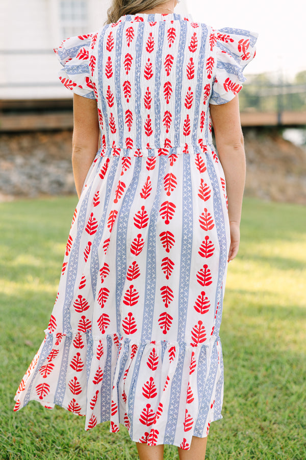 Plus Size midi dress with red leaf print, blue geometric stripes, flutter sleeves, and tiered skirt.