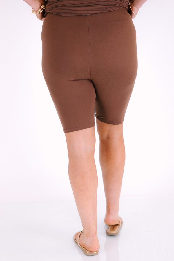 Plus Size mocha two-piece set featuring a v-neck short sleeve tunic top and matching biker shorts.