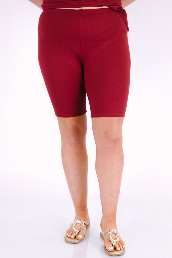 Plus Size cabernet two-piece set featuring a V-neck short sleeve tunic top and matching bike shorts.