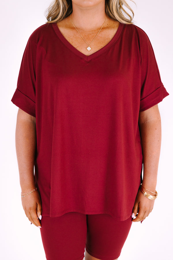 Plus Size cabernet two-piece set featuring a V-neck short sleeve tunic top and matching bike shorts.