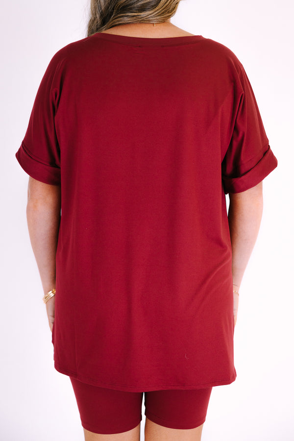 Plus Size cabernet two-piece set featuring a V-neck short sleeve tunic top and matching bike shorts.