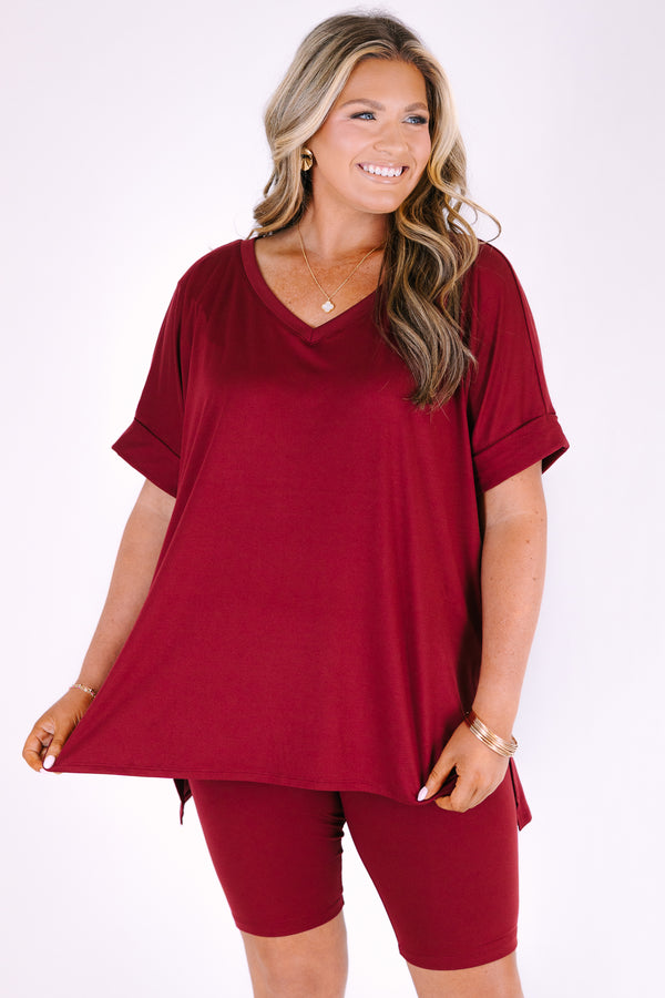 Plus Size cabernet two-piece set featuring a V-neck short sleeve tunic top and matching bike shorts.