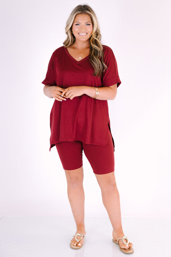 Plus Size cabernet two-piece set featuring a V-neck short sleeve tunic top and matching bike shorts.