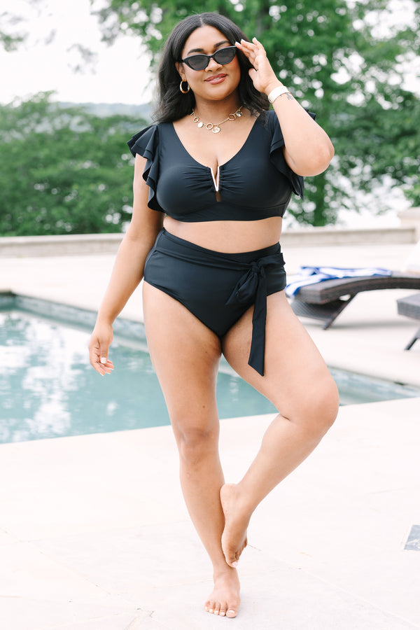 Chic Soul Plus Size Clothing, a black swim top with a gold V detail at center bust and ruffle sleeves