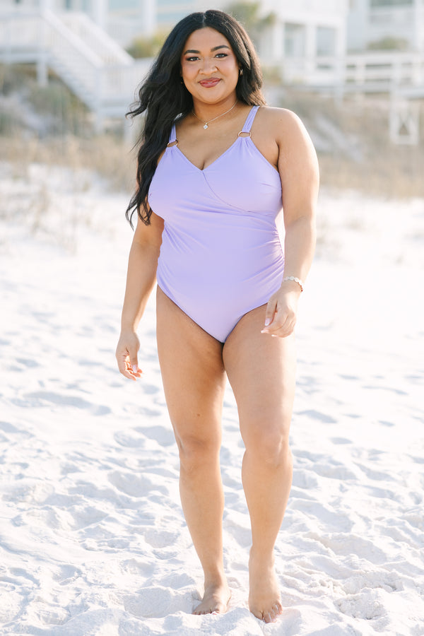 Chic Soul plus size clothing, purple one piece swimsuit with a deep v-neckline and gold ring details at the bottom of each strap