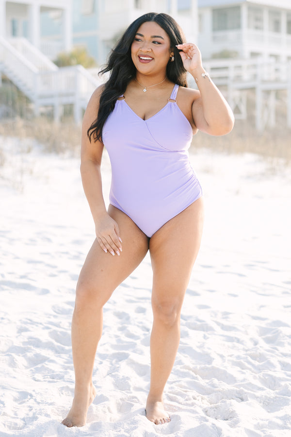 Chic Soul plus size clothing, purple one piece swimsuit with a deep v-neckline and gold ring details at the bottom of each strap
