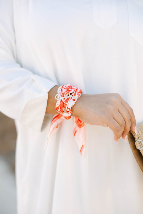 Chic Soul plus size clothing, red and white patterned bandana with gold chain wrapped around bracelet