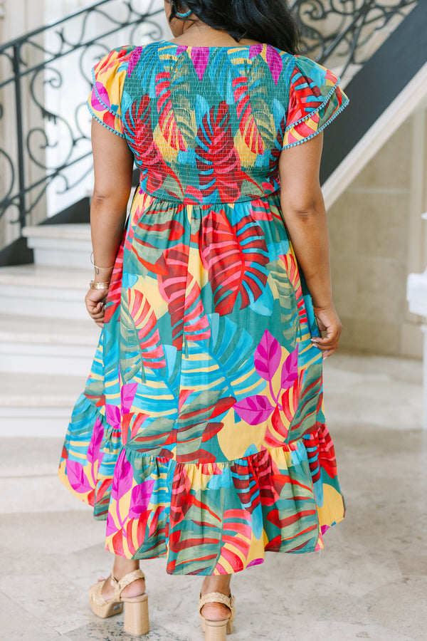 Plus Size pink tropical midi dress with a smocked bodice, flutter sleeves, and a tiered skirt.