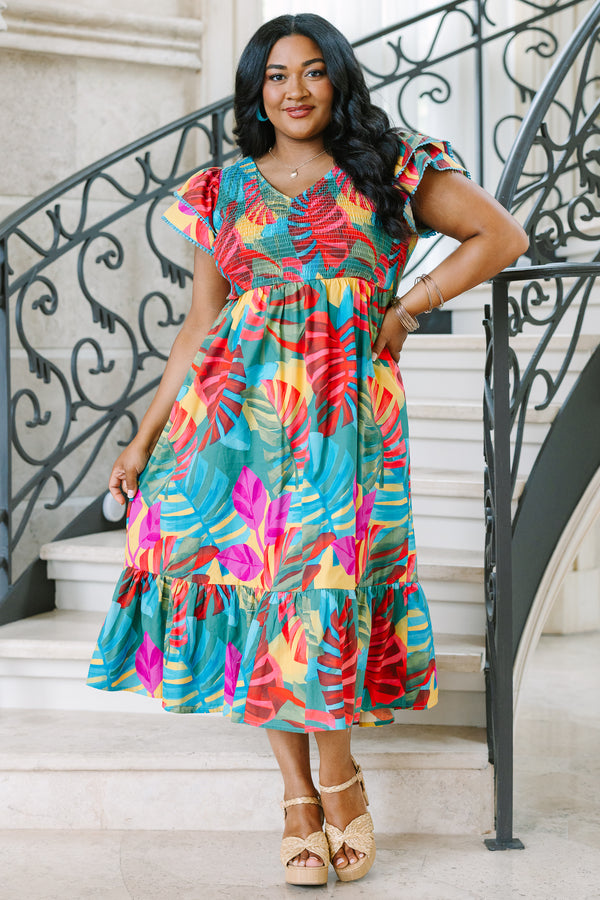 Plus Size pink tropical midi dress with a smocked bodice, flutter sleeves, and a tiered skirt.
