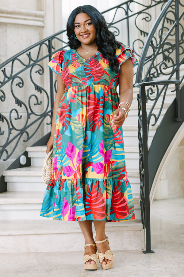 Plus Size pink tropical midi dress with a smocked bodice, flutter sleeves, and a tiered skirt.