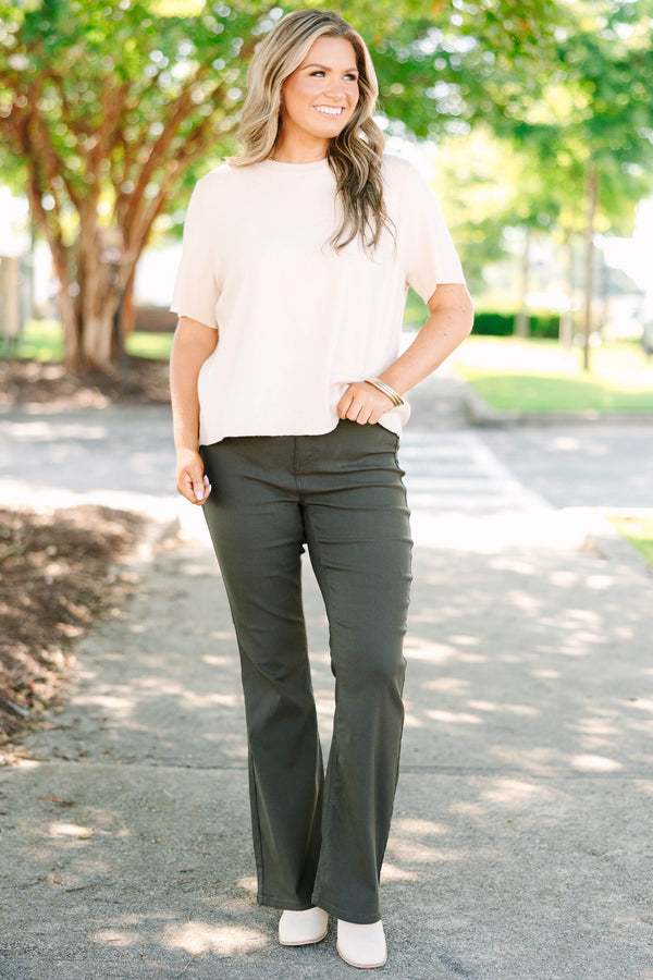 Plus size dark olive flare jeans in a stretchy rayon blend with a high-waisted, flattering fit.
