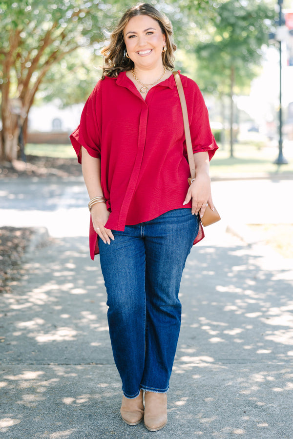 Plus size flowy wine red button-down top with a collared neck and drop shoulders.