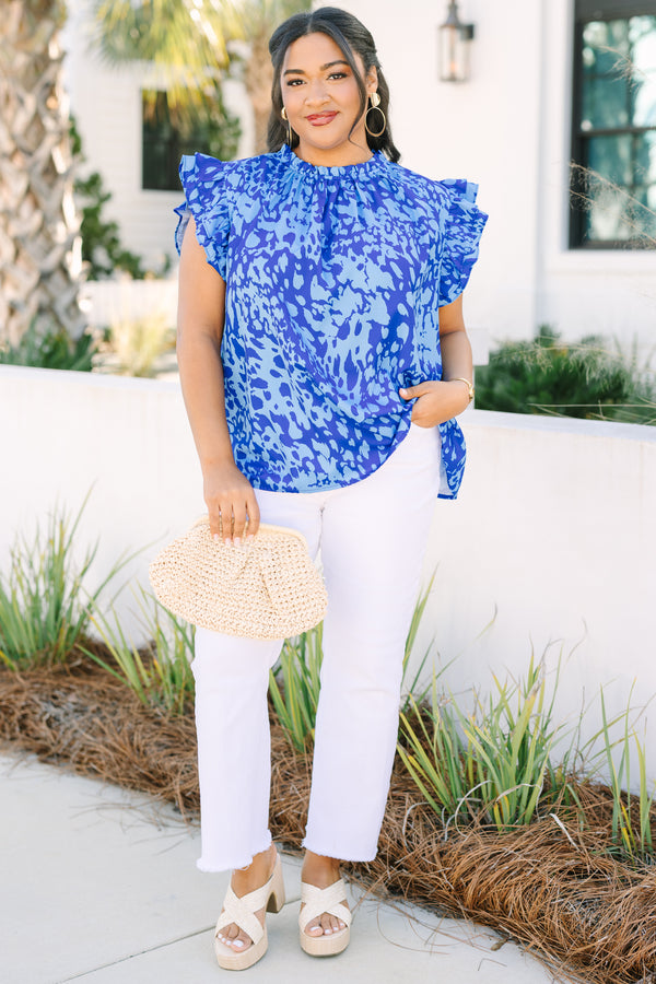 Chic Soul plus size clothing, dark blue ruffle sleeveless top with lighter blue abstract pattern and ruffle around the high neckline