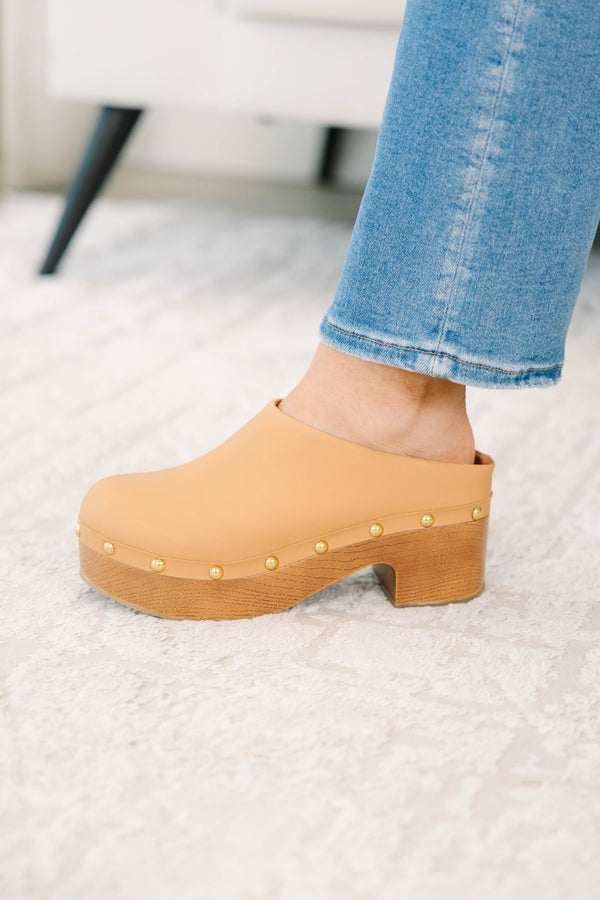 Plus Size apricot clogs with a wooden platform heel, gold stud details, and blue denim jeans.