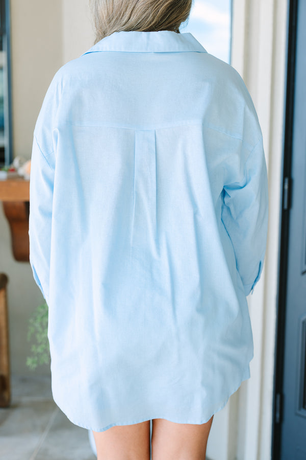 Plus Size light blue cotton-linen button-down shirt with a collar and long sleeves.