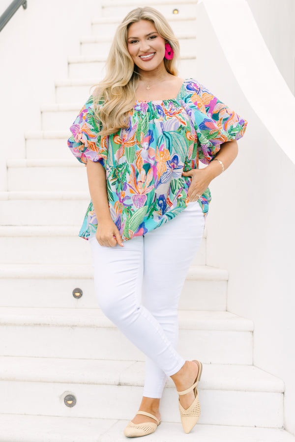 Plus Size lavender tropical abstract print top with a square neckline and puff sleeves.