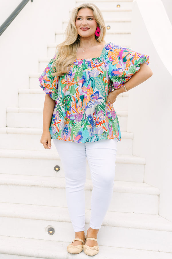 Plus Size lavender tropical abstract print top with a square neckline and puff sleeves.