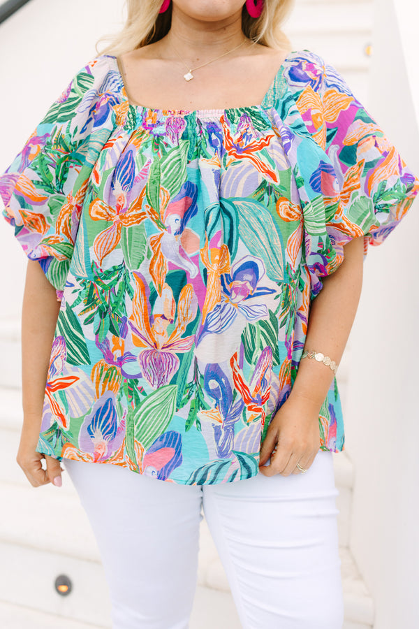 Plus Size lavender tropical abstract print top with a square neckline and puff sleeves.